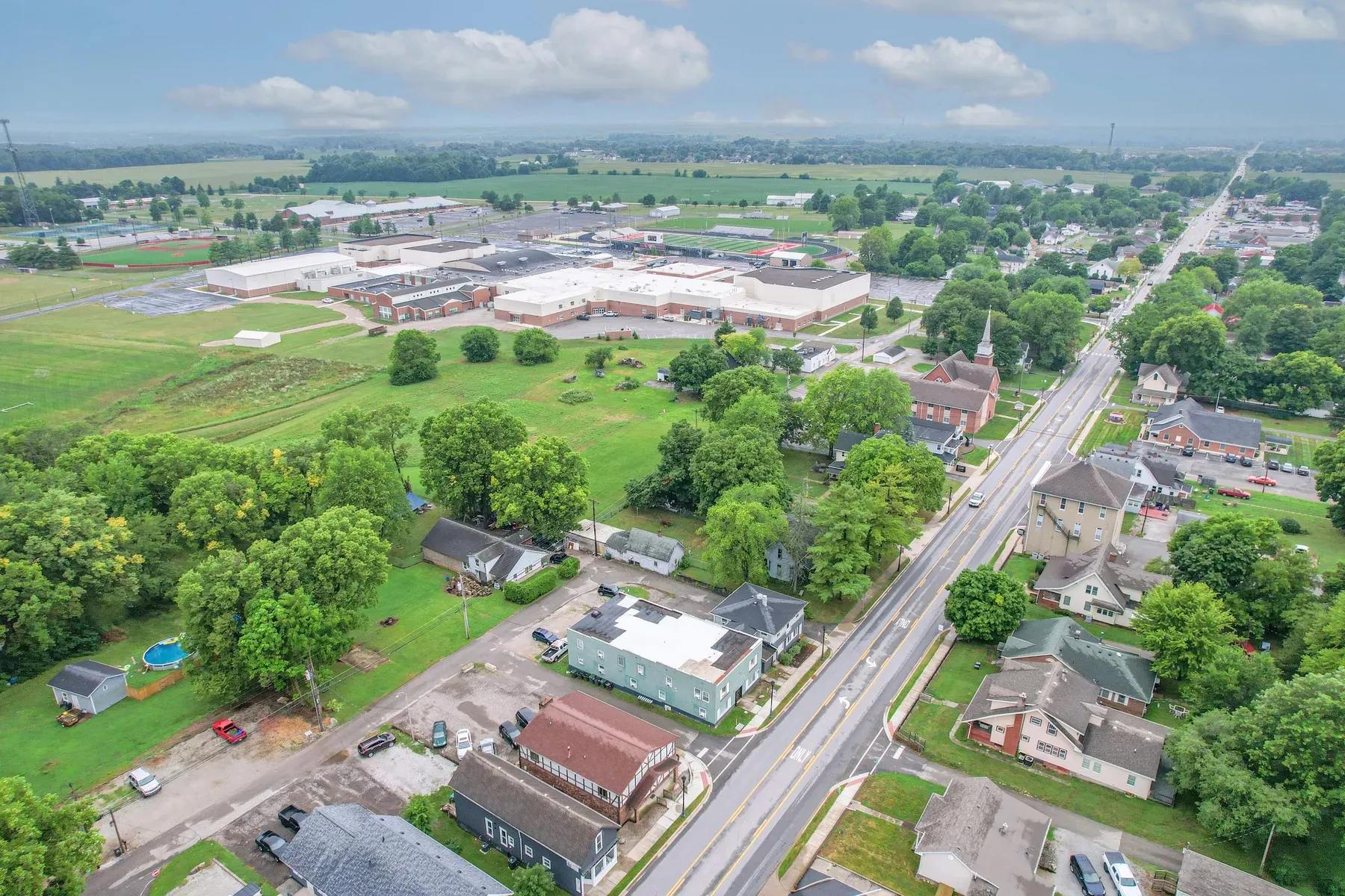 Aerial view of the town around New Palestine Apartments, New Palestine